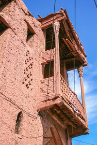 Low angle view of old building against sky