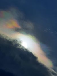 Low angle view of rainbow in sky