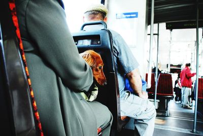 Passengers sitting in train