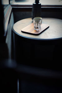 Close-up of empty coffee cup on table