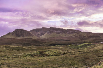 View of mountain range against cloudy sky