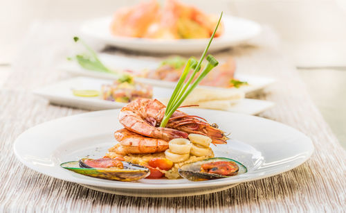 Close-up of seafood in plate on table