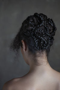 Rear view of a woman with hairstyle