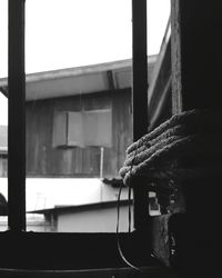 Close-up of rope tied to building