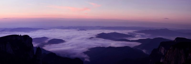 Scenic view of mountains against sky during sunset