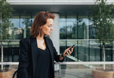 Young woman using mobile phone