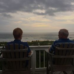 Scenic view of sea against cloudy sky