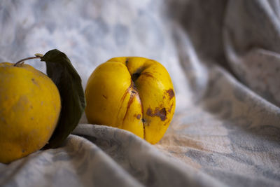 Close-up of yellow fruits on table