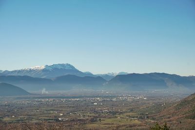 Scenic view of mountains against clear sky