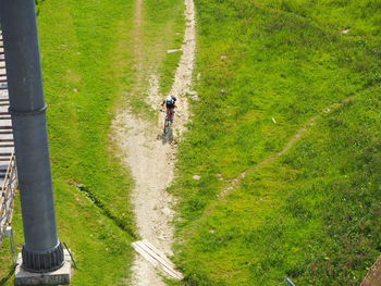 High angle view of man walking on field