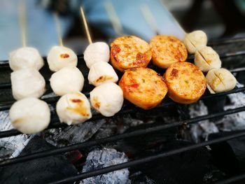 Close-up of meat on barbecue grill