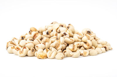 Close-up of bread against white background