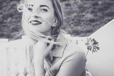 Close-up of smiling young woman