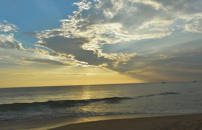 Scenic view of sea against sky at sunset