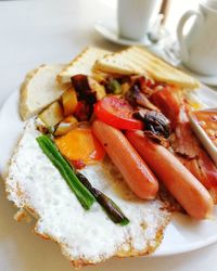 High angle view of meal served in plate on table