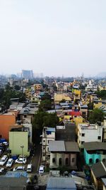 High angle view of buildings against clear sky