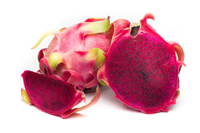 Close-up of strawberry over white background