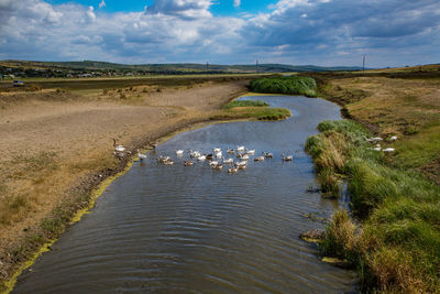 Scenic view of river against sky