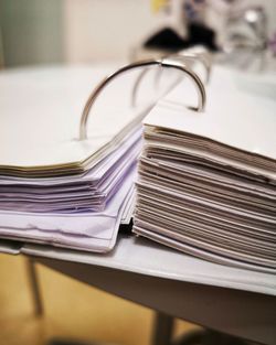 Close-up of ring binder on table in office