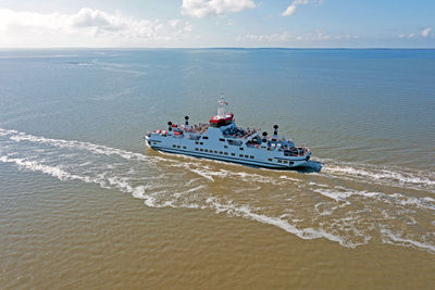 Aerial from the ferry to ameland on the wadden sea in the netherlands