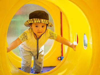 Portrait of cute boy in playground