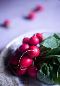 Close-up of strawberries in plate on table
