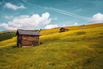 Wooden huts in the dolomites.