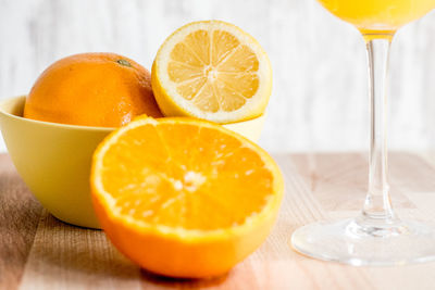 Close-up of orange juice on table