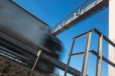 Low angle view of train against sky