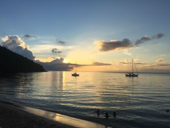 Scenic view of sea against sky during sunset