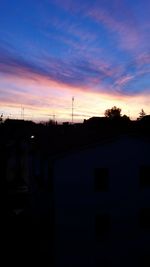 Silhouette of buildings at sunset