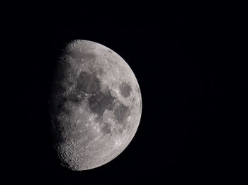 Low angle view of moon against sky at night