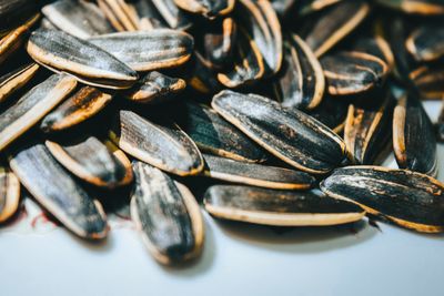 Full frame shot of roasted coffee beans on table