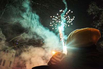 Firework display at night