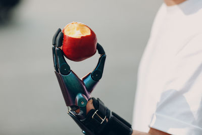 Close-up of man holding camera