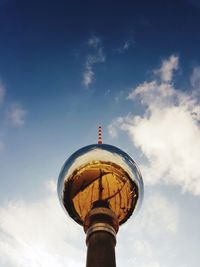 Low angle view of built structure against blue sky