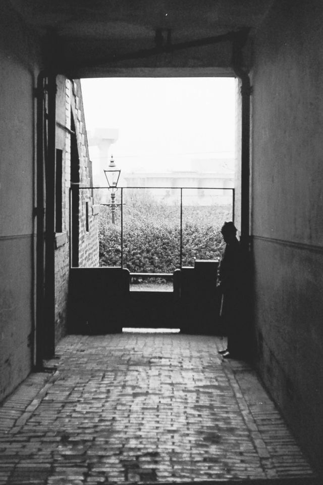 indoors, built structure, architecture, empty, window, door, flooring, sunlight, tiled floor, absence, day, corridor, the way forward, shadow, entrance, building, wall - building feature, no people, house, wall