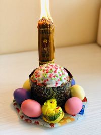 Close-up of multi colored eggs on table