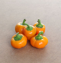 Close-up of yellow bell peppers on table