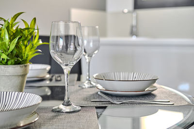 Close-up of wineglass on table