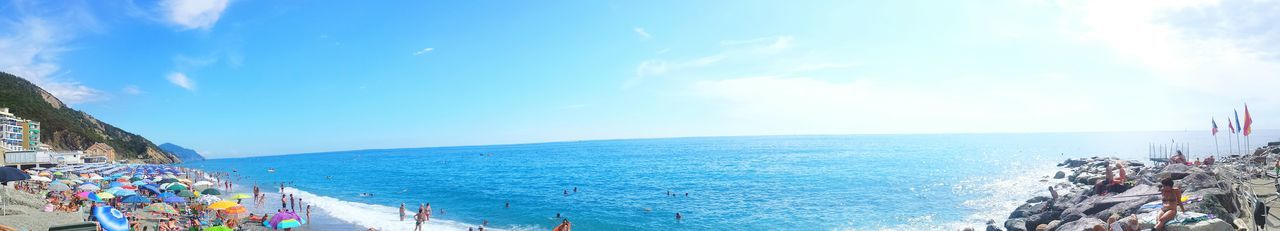 sea, horizon over water, water, beach, sky, scenics, beauty in nature, tranquility, tranquil scene, blue, shore, nature, panoramic, idyllic, vacations, cloud - sky, coastline, tourism, day, cloud