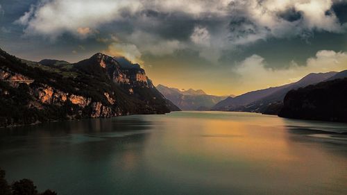 Scenic view of lake against sky during sunset