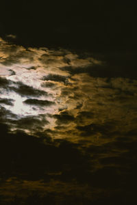 Low angle view of dramatic sky during sunset