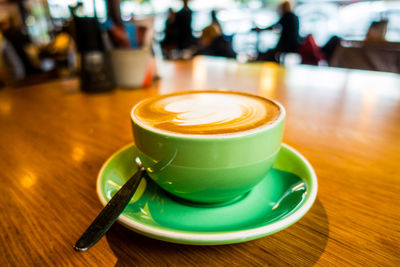 Close-up of coffee served on table