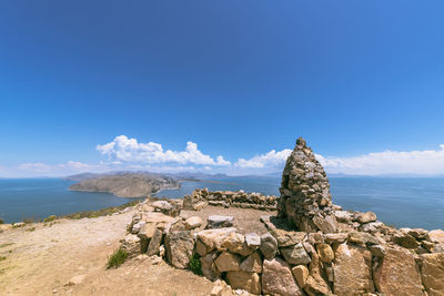 Scenic view of sea against blue sky