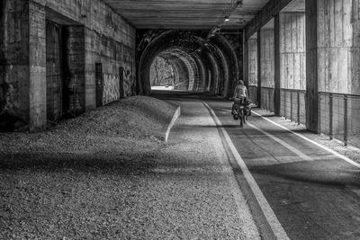 Man riding bicycle on building