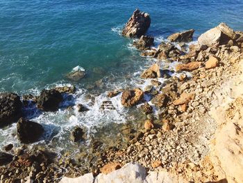 High angle view of rocks on beach