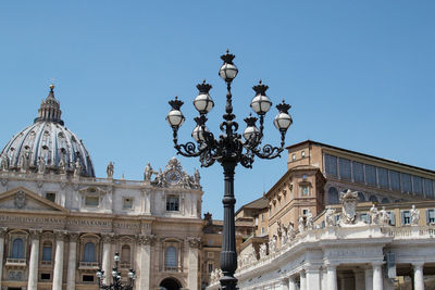 Low angle view of building against blue sky