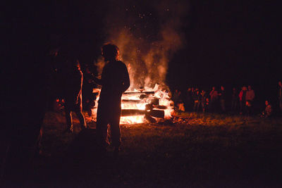 Rear view of man enjoying at concert