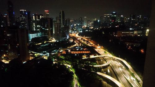 High angle view of illuminated cityscape at night